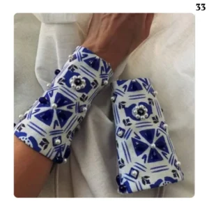 Cuffs with blue stone embroidery design