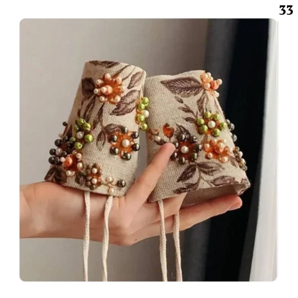 Hemp cuffs with stone embroidery design