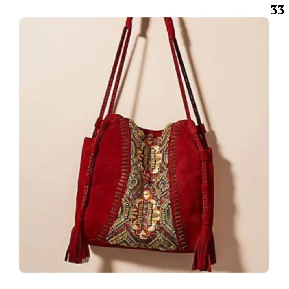 Suede shoulder bag with traditional design and special red color